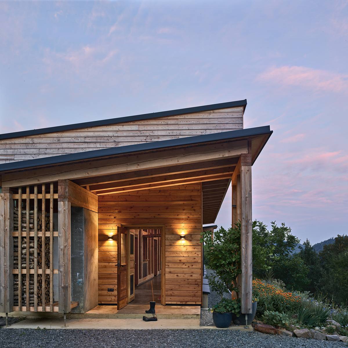 The timber entrance of the house at dusk